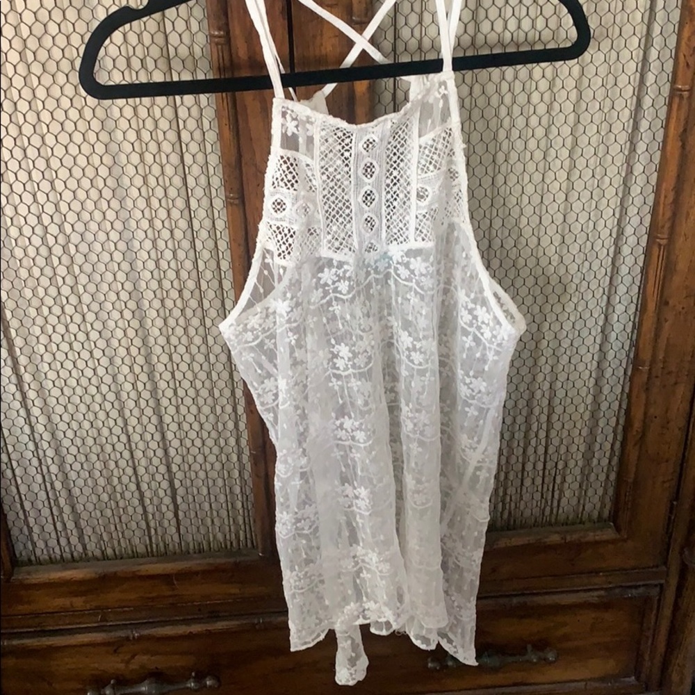 Maurice’s White lace tank top.